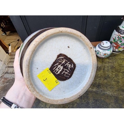 1363 - A pair of Chinese famille rose crackle glaze vases, 29.5cm high; together with a similar pair of jar... 