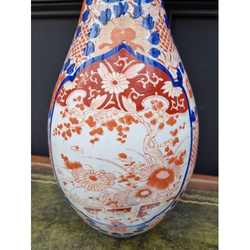 1372 - A large Japanese Imari vase, Meiji, with flared rim, 61.5cm high.