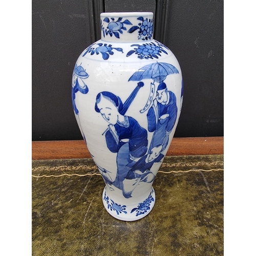 1376 - A Chinese blue and white vase and associated cover, four character mark to base, 32cm high.... 