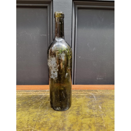 1385 - A 1903 Chateau Lafite glass wine bottle, 30cm, (lacking contents). 