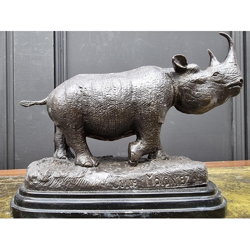 1389 - Two bronze rhinoceros, each bearing signature, on marble bases, 27cm long, (lost tip of one hor... 