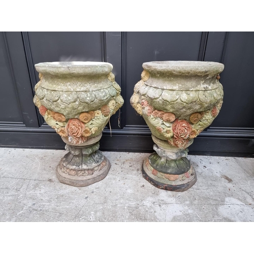 1148 - A pair of composition stone garden planters, 64cm high. 