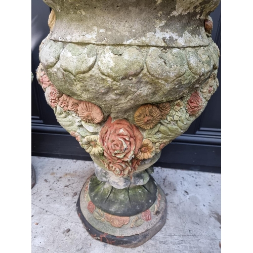 1148 - A pair of composition stone garden planters, 64cm high. 