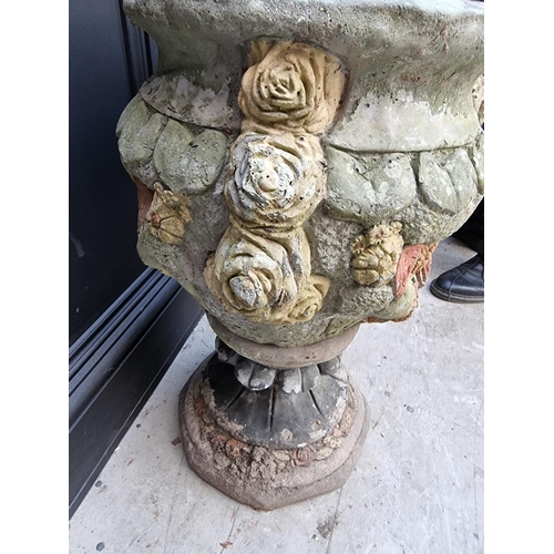 1148 - A pair of composition stone garden planters, 64cm high. 