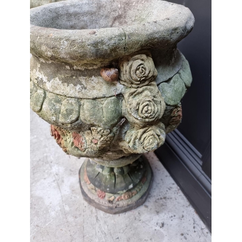 1148 - A pair of composition stone garden planters, 64cm high. 