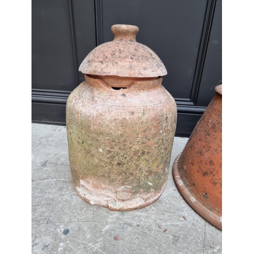 1151 - An old weathered terracotta rhubarb forcer and cover, 50cm high; and another. (2) ... 