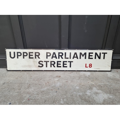 1176 - An aluminium 'Upper Parliament Street' road sign, 30.5 x 144.5cm.This sign is from Toxteth, Liverpoo... 