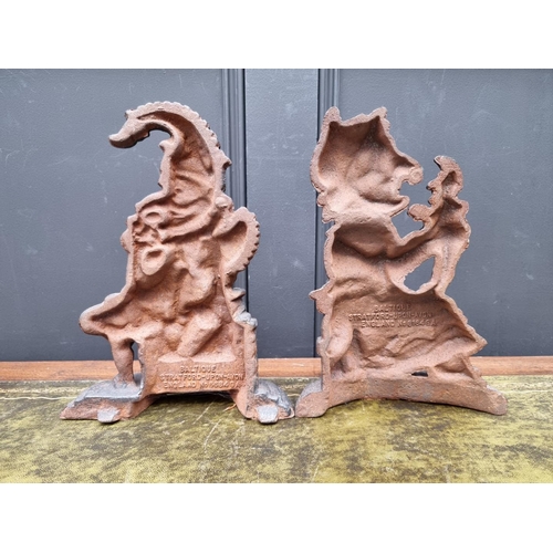 1181 - A pair of cast iron 'Punch' and 'Judy' doorstops, each inscribed 'Baltique, Strafford-Upon-Avon'.... 