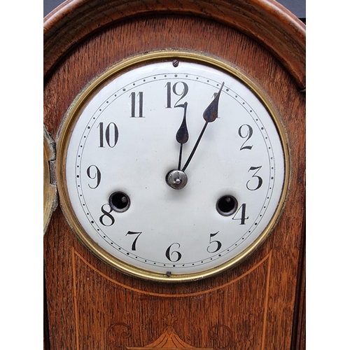 1186 - A circa 1900 oak and inlaid mantel clock, 33.5cm high.