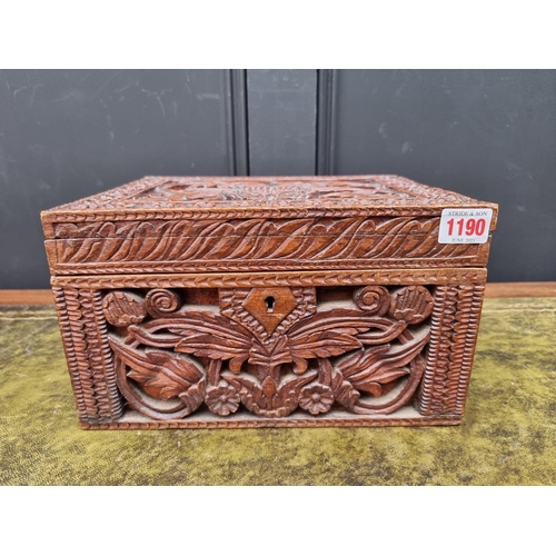 1190 - An Eastern carved wood casket, 28.5cm wide. 