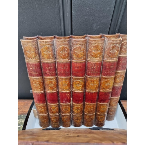 1193 - Nine simulated leather book spines, largest 31.5 x 29cm. 