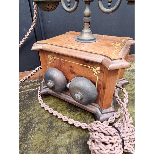 1203 - Two antique style marquetry telephones. 