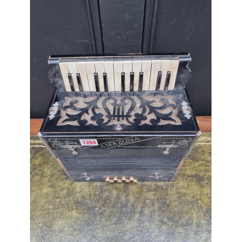 1204 - An Amazona piano accordion. 