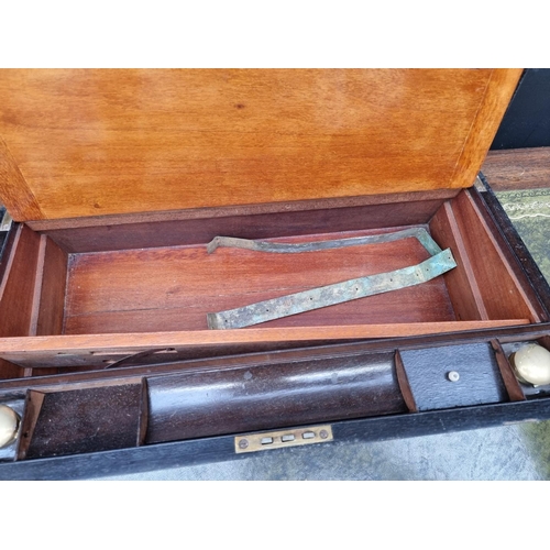 1205 - A large walnut and brass bound writing slope, 50cm wide; together with another rosewood example... 