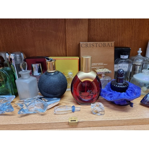 1224 - A collection of vintage perfumes, to include a large quantity of empty bottles. ... 