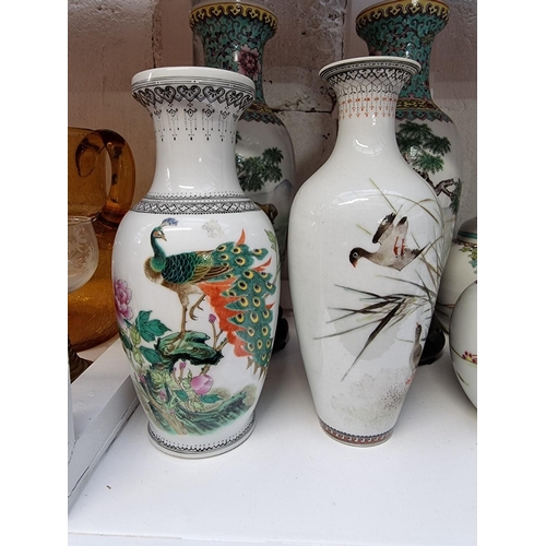 1230 - A collection of Chinese famille rose porcelain, to include a pair of vases, 25.5cm high. (12) ... 