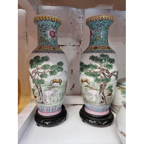 1230 - A collection of Chinese famille rose porcelain, to include a pair of vases, 25.5cm high. (12) ... 