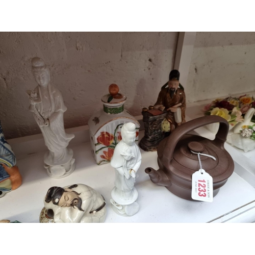 1233 - A collection of Chinese ceramics, to include figures, largest 24cm high; and a Yixing teapot and cov... 