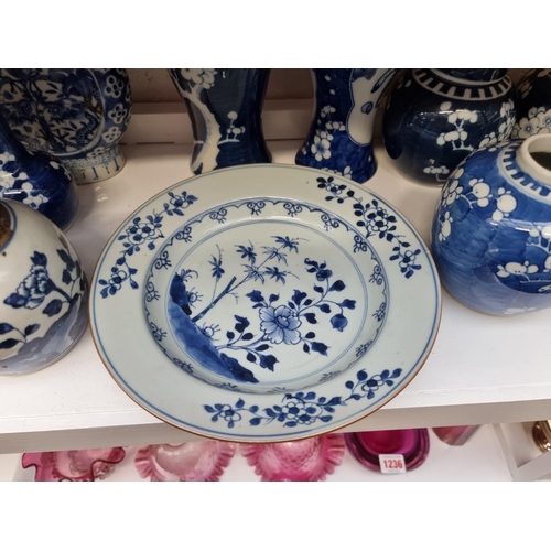 1235 - A collection of Chinese blue and white porcelain, 18th century and later, (moonflask damaged). (12)... 