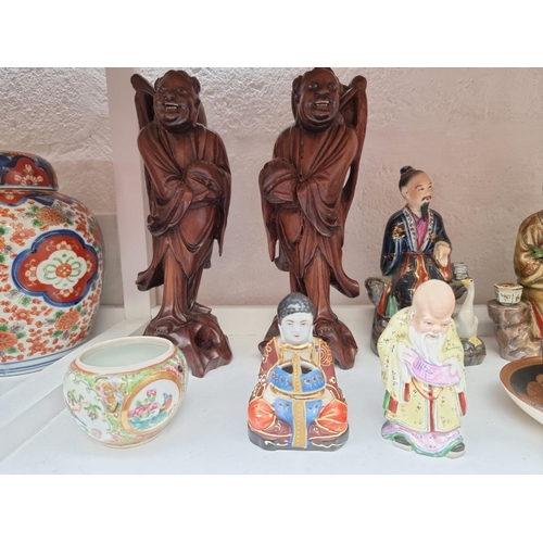 1238 - A mixed group of Chinese and Japanese ceramic works of art, largest 27.5cm high. (10) ... 