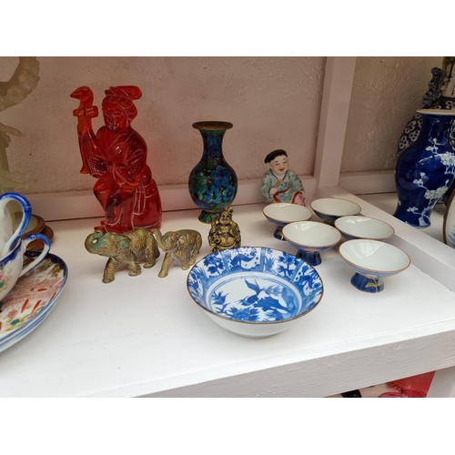 1238 - A mixed group of Chinese and Japanese ceramic works of art, largest 27.5cm high. (10) ... 