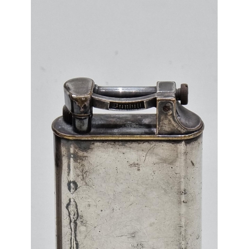 1260 - Two Art Deco electroplated lighters, comprising: a Parker Roller Beacon example, 13cm high; and a Du... 