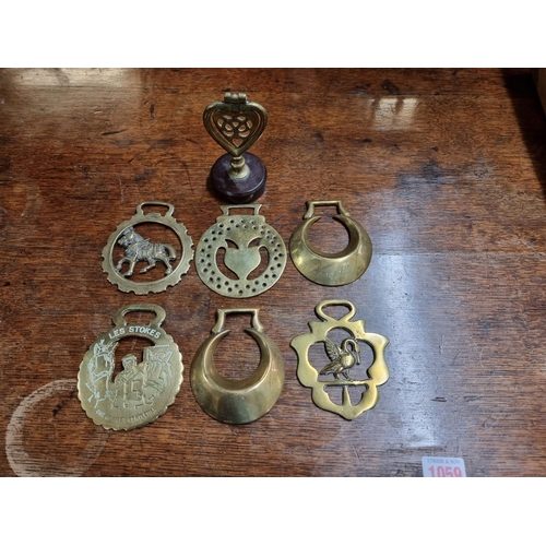 1312 - A collection of martingales, horse brasses and related, to include a pair of brass stirrups.... 