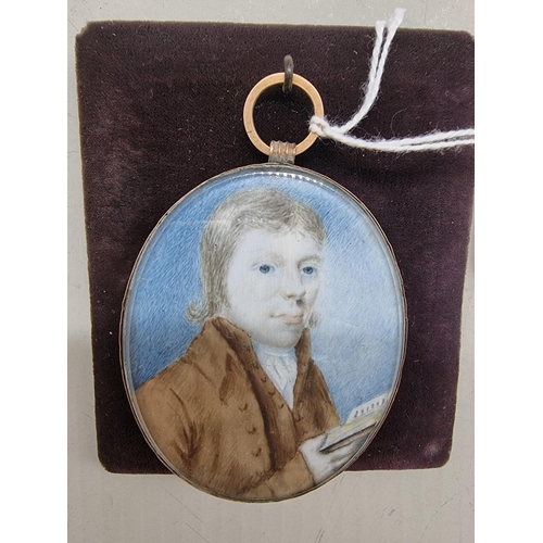 1525 - English School, 18th century, bust length portrait miniature of a gentleman holding a book, on ... 