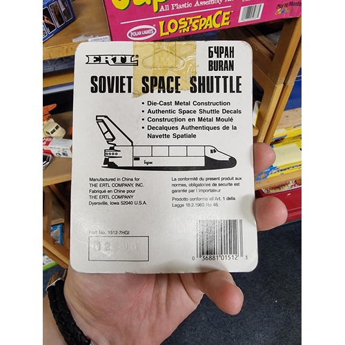 15 - Diecast: a collection of vintage diecast vehicles, to include an Ertl Soviet Space Shuttle, in origi... 