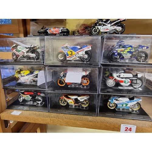 24 - Racing Bikes: a collection of forty scale model champion racing bikes by De Agostini, majority ... 