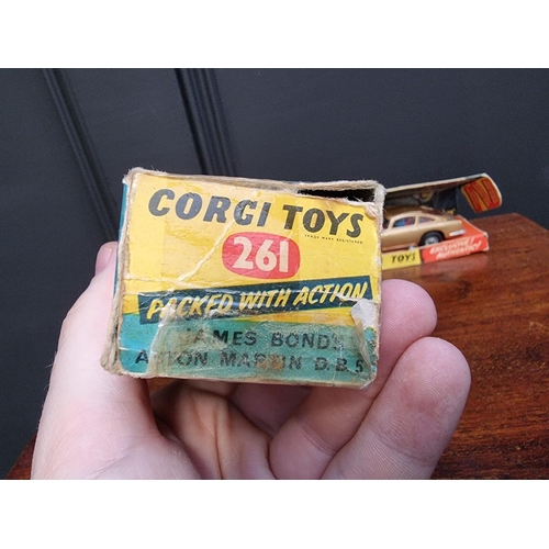 35 - Corgi: a vintage James Bond 'Goldfinger' Aston Martin DB5 in original box, (heavily taped with some ... 