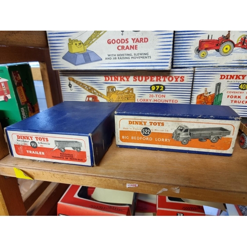 37 - Dinky Toys: eight boxed vintage Dinky Toys, to include Farm Tractor & Hay Rake; and a Goods... 