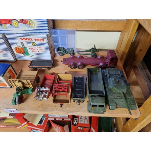 37 - Dinky Toys: eight boxed vintage Dinky Toys, to include Farm Tractor & Hay Rake; and a Goods... 