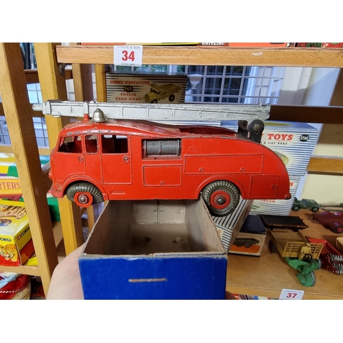 37 - Dinky Toys: eight boxed vintage Dinky Toys, to include Farm Tractor & Hay Rake; and a Goods... 