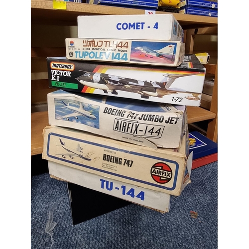 40 - Model Kits: a group of eight unmade kits, to include: a vintage Airfix Boeing 747 Jumbo Jet; a simil... 