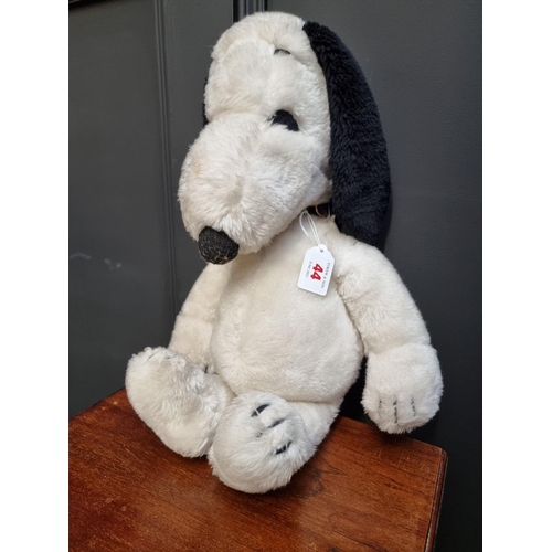 44 - Snoopy: a vintage plush Snoopy, with original leather collar.