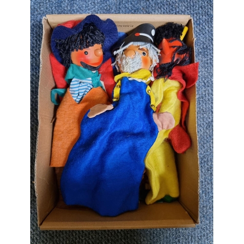 63 - Glove Puppets: a set of eight, with wooden heads and felt bodies.