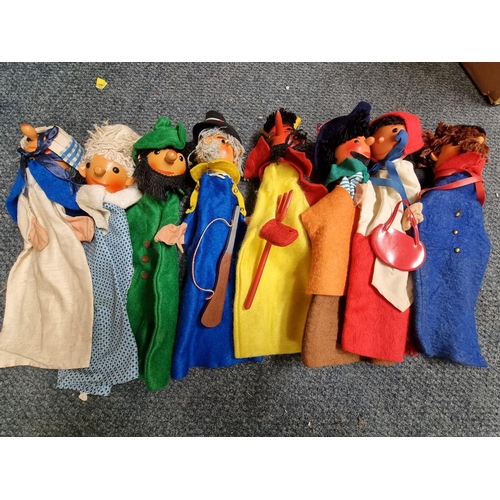 63 - Glove Puppets: a set of eight, with wooden heads and felt bodies.