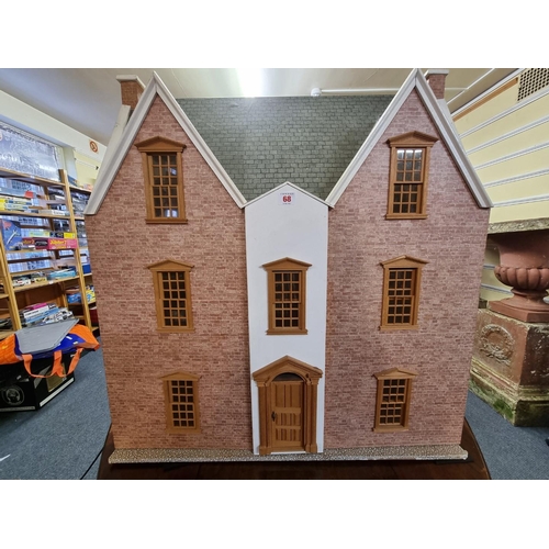 68 - Dolls House: a large three storey wooden dolls house, 87cm high x 78.5cm wide x 35.5cm deep.... 