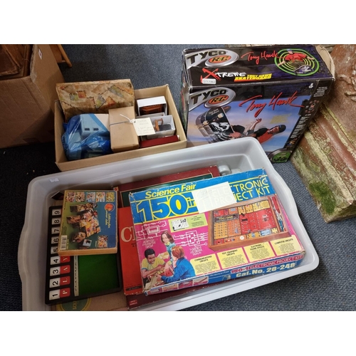 70 - Toys and Pastimes: a Tyco R/C Tony Hawk, boxed; together with a group of board games and similar; to... 