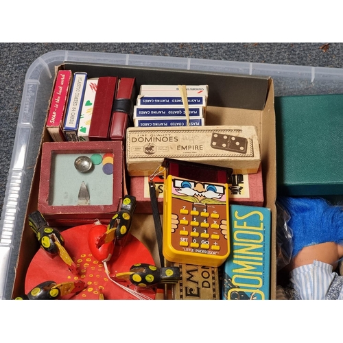 71 - Toys and Pastimes: a group of vintage games, to include Winkles Wedding, a boxed set of carpet bowls... 