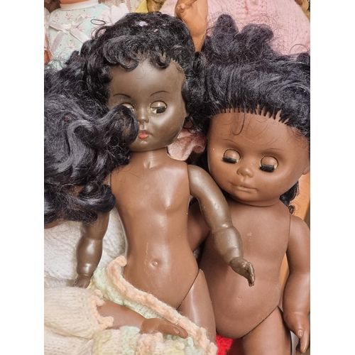 73 - Dolls: a collection of vintage dolls, to include examples by Palitoy and two 'Roddy' dolls.... 