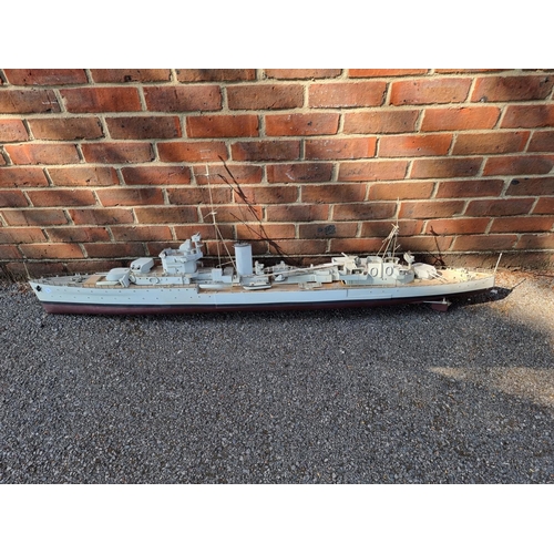 76 - A large painted ply battleship, 'Aurora', 160cm long.