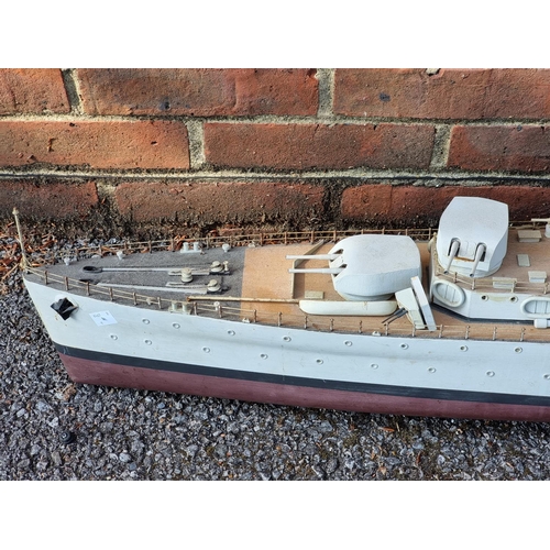 76 - A large painted ply battleship, 'Aurora', 160cm long.