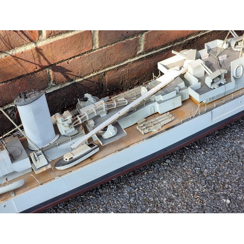 76 - A large painted ply battleship, 'Aurora', 160cm long.