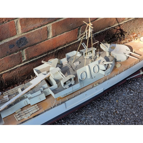 76 - A large painted ply battleship, 'Aurora', 160cm long.