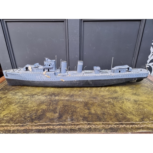 77 - A painted wood model of HMS Fury, 91cm long.