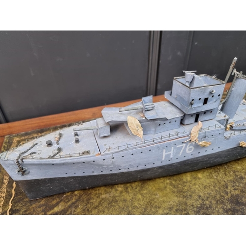 77 - A painted wood model of HMS Fury, 91cm long.