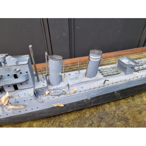 77 - A painted wood model of HMS Fury, 91cm long.