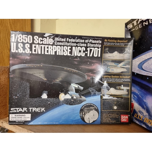 9 - Star Trek: U.S.S. Enterprise, two unmade boxed scale models, one by Bandai. (2)